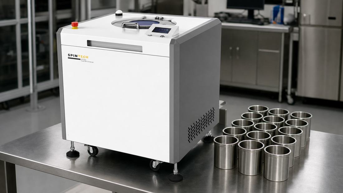 centrifuge maintenance for the Spin Tech STP-3000 on a stainless lab bench with stainless cup inserts