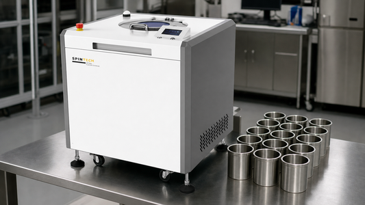 centrifuge maintenance for the Spin Tech STP-3000 on a stainless lab bench with stainless cup inserts