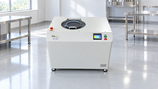 Planetary centrifuge applications in a bright industrial processing facility featuring the Spin Tech STP-1500.
