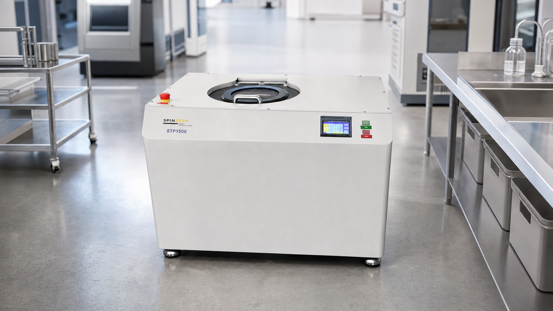 Planetary centrifuge — Spin Tech STP-1500 planetary centrifuge in an industrial processing lab