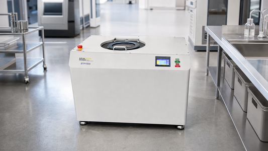 Planetary centrifuge — Spin Tech STP-1500 planetary centrifuge in an industrial processing lab