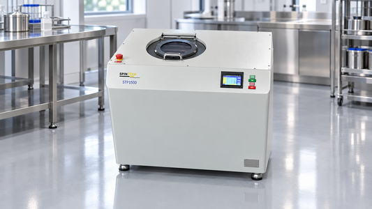Planetary centrifuge Spin Tech STP-1500 in a clean modern industrial processing lab.