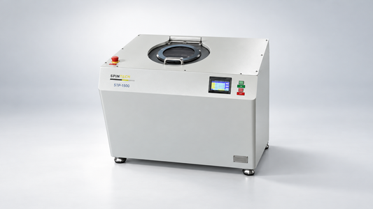 Planetary centrifuge comparison featuring a Spin Tech STP-1500 in a neutral studio setting.