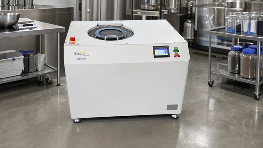planetary centrifuge Spin Tech STP-1500 in a clean modern industrial processing lab