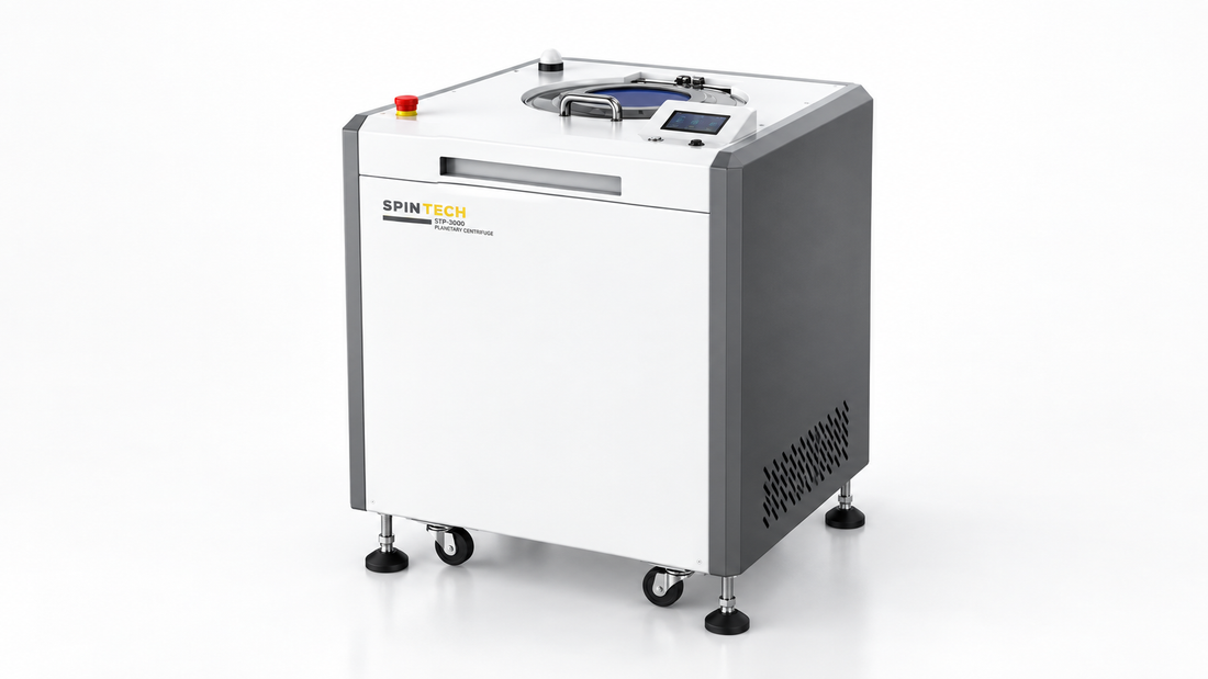 STP-1500 vs STP-3000 comparison showing a Spin Tech planetary centrifuge in a clean studio